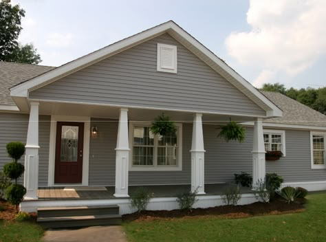 covered portico/porch/deck added to the front of a long, straight, ranch style house.  Love this! Front Porch Addition, Porch Kits, Ranch Remodel, Porch Addition, Building A Porch, Porch Roof, Front Patio, Exterior Remodel, Ranch Style Homes