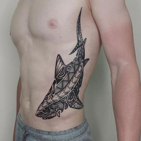 23 Shark Tattoo Ideas and Meanings - 2023 Guide Shark Maori Tattoo, Shark Tattoo Polynesian, Shark Tattoos Men, Geometric Shark Tattoo, Hawaii Tattoo Men, Shark Tattoo Back, Shark Tattoo Men, Tiger Shark Tattoo, Jaws Tattoo