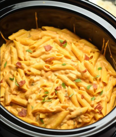 This is pure food perfection. I could eat it endlessly  BUFFALO CHICKEN PASTA Crock Pot Bow Tie Pasta Recipes, Crock Pot Bow Tie Pasta, Crockpot Buffalo Chicken Mac And Cheese, Buffalo Chicken Pasta Crock Pot, Slow Cooker Buffalo Chicken Mac N Cheese, Buffalo Chicken Mac And Cheese Instapot, Crockpot Buffalo Chicken Pasta, Crockpot Pasta, Buffalo Chicken Pasta