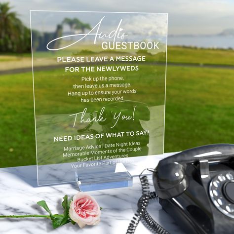 PRICES MAY VARY. Timeless Elegance: Crafted from top-quality crystal-clear acrylic, this audio guest book sign with a sturdy acrylic base adds a touch of sophistication to your wedding decor, creating a beautiful focal point that reflects your love story. Interactive Experience: Create a fun and interactive atmosphere as guests gather around to leave their messages, fostering connection and celebration in a way that traditional guestbooks simply can't match. Personalized Messages: Encourage your Things For Guests To Sign At Wedding, Frosted Acrylic Sign, Guest Signing Table Wedding, Audio Phone Guest Book, Audio Guest Book Sign, Guest Book Acrylic Sign, Leave A Message Sign, Guest Signing Table, Phone Guest Book