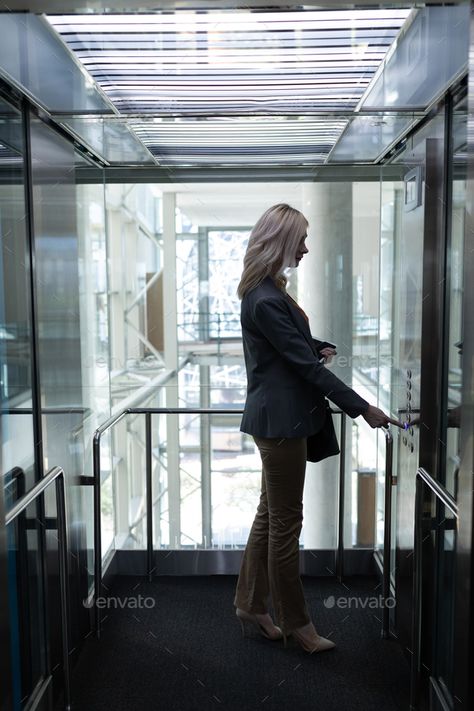 Side view of pretty young blonde Caucasian businesswoman using elevator in modern office by Wavebreakmedia. Side view of pretty young blonde Caucasian businesswoman using elevator in modern office #Affiliate #young, #blonde, #pretty, #Side Luxury Fonts, Elevator Buttons, Luxury Font, Fonts Typography, Residential Building, Modern Office, Side View, Business Women, Dreaming Of You