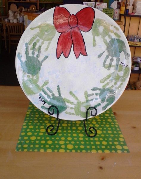 Handprint Wreath Platter #christmas #ceramics Handprint Plates For Christmas, Diy Christmas Plates For Kids Hand Prints, Christmas Cookie Plate Diy Kids, Christmas Plates Diy Kids, Handprint Platter Diy, Christmas Kids Plates Hand Prints, Hand Print Christmas Plate, Christmas Plate For Grandparents, Hand Print Santa Cookie Plate