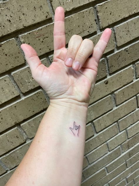 American Sign Language ASL I Love You Tattoo Small I Love You Tattoo Sign Language, Ily Sign Tattoo, Love Hand Sign Tattoo, Ily Hand Sign Tattoo, Asl I Love You Tattoo Simple, Slp Tattoo Ideas, I Love You Hand Tattoo, I Love You Sign Language Tattoo Simple, Asl I Love You