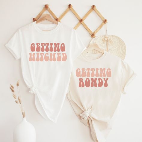 #BacheloretteShirts #BrideSquad #BachelorettePartyIdeas #BrideToBe #LastFlingBeforeTheRing #Bridesmaids #BacheloretteFashion #BacheloretteTees #BrideTribe #BacheloretteCelebration #BacheloretteOutfits #BridalPartyShirts #BacheloretteStyle #BrideSquadGoals #BacheloretteWeekend #BrideVibes #BacheloretteCrew #BachelorettePartyShirts #BrideTribeVibes #BacheloretteSwag Texas Bachelorette Party Shirts, Austin Texas Bachelorette Party Shirts, Getting Rowdy Bachelorette, Dollywood Bachelorette Party, Nashville Bachelorette Party Favors, Ranch Bachelorette Party, Austin Texas Bachelorette Party, Bachelorette Last Rodeo, Getting Hitched Getting Rowdy