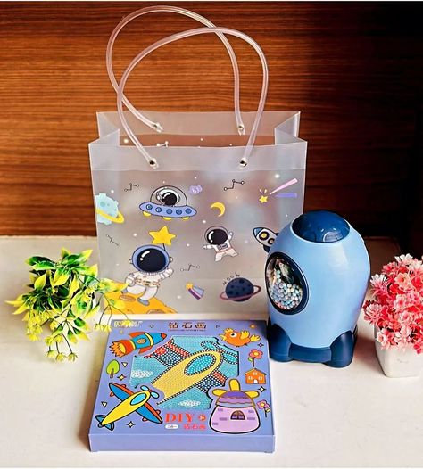 *Space hamper* Inlcudes: -Pvc hand bag/ Gifting bag ⁃ Rocket piggy bank - Diy bead Frame set (Random color will dispatch) #spacehamper #besthamper #spacehampers #hamperforkids #kidsspace #spacetheme #spaceparty #spaceideas #hamperforkids #KidsFashionFinds #kidsbirthdayideas #returngiftsforbirthdays #birthdaypartydecor #birthdaygifts #giftforgirls Space Theme Birthday Return Gifts, Piggy Bank Diy, Birthday Return Gifts, Return Gifts, Bead Frame, Return Gift, Instagram Reel, Space Party, Space Theme