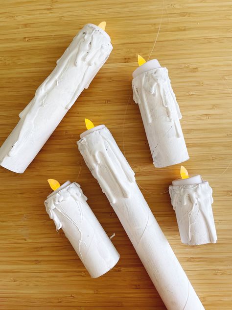 These DIY floating candles are so fun and simple! They add just the amount of spooky you want to any space! PLUS they are just toilet paper rolls! Win Win! Happy Haunting! Candle Diy Projects, Diy Pumpkin Candle, Diy Floating Candles, Diy Old Books, Decoupage Candles, Rolled Candles, Twisted Candles, Citrus Candle, Egg Candle