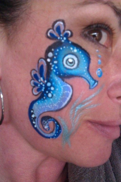 Sea horse, face paint Seahorse Face Paint, Sea Creatures Face Painting, Ocean Face Painting, Mermaid Facepainting Kids Easy, Horse Face Paint, Face Paint Ocean Theme, Mime Face Paint, Animal Face Paintings, Cheek Art