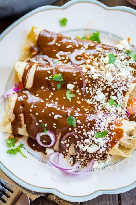 Mole Chicken Enchilada with Homemade Mole Sauce Recipe | ChefDeHome.com Mole Enchiladas Recipe, Mole Recipes, Chicken Mole Enchiladas, Mole Sauce Recipe, Mole Chicken, Enchiladas With Black Beans, Mole Enchiladas, Mexican Mole Sauce, Spanish 101