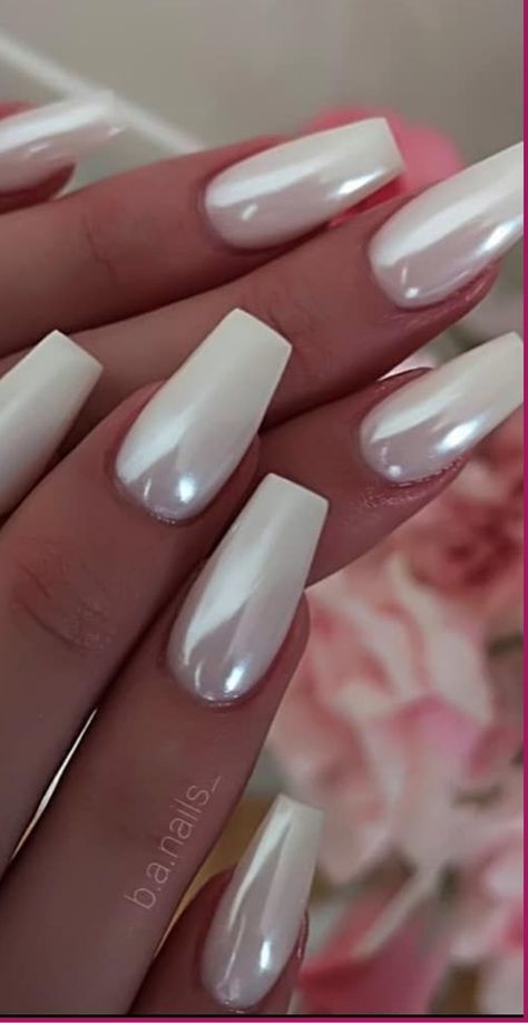 Enhance your nail game with the dazzling elegance of Milky White Chrome Nails! This modern and chic nail color blends the futuristic vibe of chrome with the purity of milky white, creating a mesmerizing effect that exudes sophistication. Ideal for any occasion, these nails will make you feel like a goddess with their eye-catching metallic sheen. Let your nails shine bright and steal the spotlight with this ethereal shade. Sheen Nails, White Nail Acrylic Ideas, Nails For Engagement Party, White Frost Nails, Elegant Milky Nails, Wedding White Nails, Bright White Nails, White Nail Polish With Chrome, White Chrome Acrylic Nails