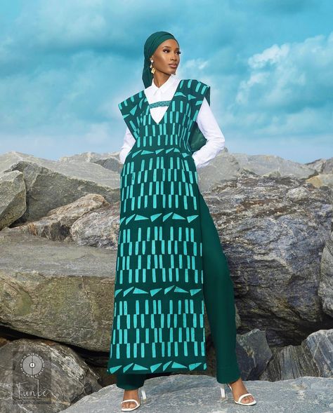 Benin-based FUNKE Fashion House presents its latest collection, “Reloaded,” featuring pieces crafted from cotton dyed with traditional Batik artistry and detailed with woven fabric. 📸 @_funkefashionhouse_ Green Long Dress, Ankara Clothing, Long Green Dress, African Skirts, African Fashion Ankara, Fashion Landscape, Embroidered Sleeves, African Design, Ankara Styles