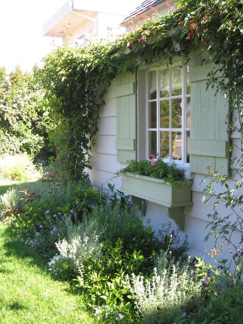 instant curb appeal: window boxes (WITH flowers), climbing vines, painted shutters and multipaned windows. Flagstone Garden, Shed Inspiration, Posh Sheds, Painting Shutters, Cozy Garden, Grandma's Garden, Booth Displays, Garden Types, Guest Cottage