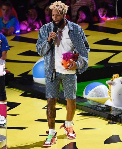 Odell Beckham Jr. wearing the Louis Vuitton x Supreme denim jacket and jeans (that he cut to shorts), with the Off-White x Nike AJ1's Supreme Denim Jacket, Obj Style, Sneaker Fits, Scary Ocean, Denim Jacket And Jeans, Off White X Nike, Kids Choice Awards, Odell Beckham, Odell Beckham Jr