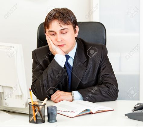 Bored Modern Business Man Sitting At Desk In Office Stock Photo ... Person Sitting At Desk Drawing, Person Sitting At Desk Drawing Reference, Man Sitting At Desk, Desk In Office, Desk Reference, Sitting At Desk, Drawing Desk, Person Drawing, Human Figure Drawing