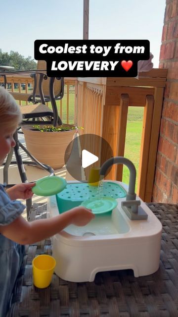 Allison Tarullo on Instagram: "“Splish splash, little Emma! 🚰💦 

This girl could wash dishes all day with her new toy sink from @lovevery 💁‍♀️

Until this point, her favorite toy was her play kitchen where she made us all the soups, birthday cakes, eggs, and cookies. Now she’s taking her mini “master chef” routine a step further washing her play fruits and dishes with REAL running water. 

It’s educational, it’s fun, and it’s mess-free (well, mostly 😉). Swipe to see the magic in action!! 

What’s your toddler’s favorite pretend play activity? #ToddlerToys #PretendPlay #learningthroughplay #lovevery #playtime #kitchenplay #toddlerlife #dishwashing #toddlermoments #toddleractivities #toddlerplay #kitchentoys #kitchenfun #toddlerfun #playtime #momlife" Play Activity, New Toy, Toddler Play, Master Chef, Splish Splash, Toddler Fun, Toddler Life, Toy Kitchen, Washing Dishes