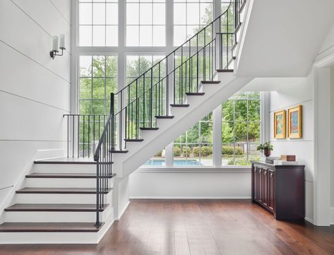 English Manor-Style - Harrison Design Stairs In Front Of Window, Staircase Shapes, Colonial Villa, U Shaped Stairs, Modern Manor, U Shaped Staircase, Homes In Ireland, Staircase Design Modern, Harrison Design