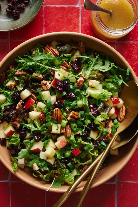 A bold salad with arugula, crisp apples, sweet dried cranberries, pecans and scallions, tossed in a five-ingredient apple cider dressing. Arugula Apple Salad, Arugula Salad Dressing, Apple Cider Dressing, Holiday Appetizers Recipes, Pecan Salad, Cranberry Salad, Apple Salad, Apple Cranberry, Arugula Salad