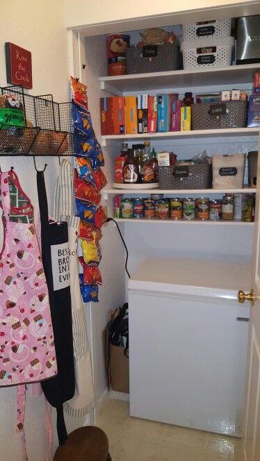 Pantry- wish I would have taken a before picture, because it used to be floor to ceiling shelves,  which were made of press board- totally ugly.  Hubby had the great idea to bring the chest freezer in,  and he built the new shelves.  Thanks to target for the storage- total cost was about $80. Pantry With Freezer Chest, Walk In Pantry With Deep Freezer, Chest Freezer In Pantry, Pantry With Chest Freezer, Deep Freezer In Pantry, Freezer Decor, Walk In Pantry Ideas Layout, Floor To Ceiling Shelves, Small Pantry Closet