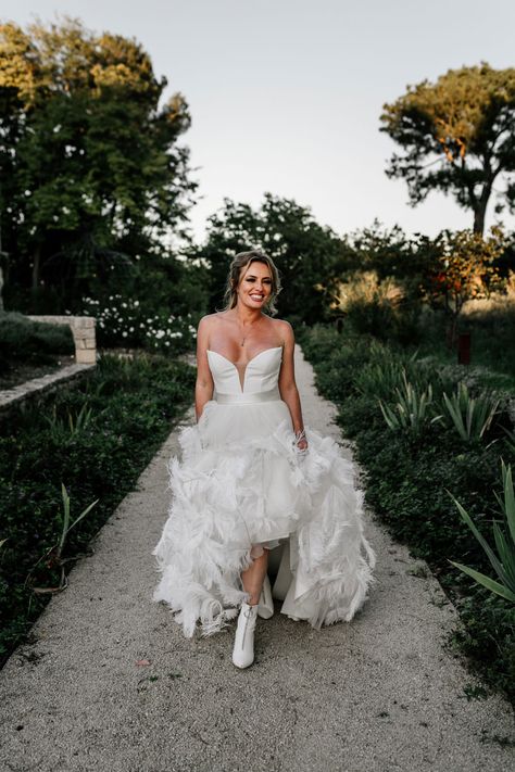 Bride Boots and Feather Wedding Dress | By Epic Love Story | Bride Dress | Low V Front Wedding Dress | Bride Shoes Dress With White Boots, Boots For Wedding, White Wedding Boots, Feather Wedding Dress, Bride Boots, Wrap Wedding Dress, Wedding Dress With Feathers, Plain Wedding Dress, Wedding In France