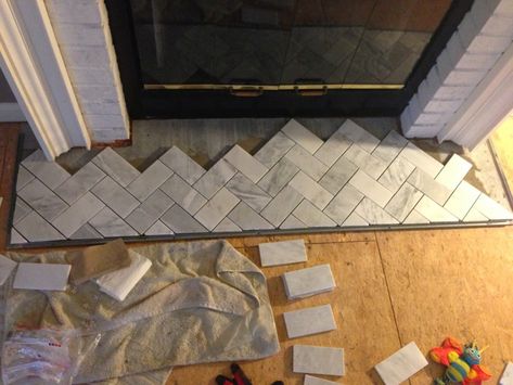 Tile Hearth, Fireplace Hearth Tiles, Marble Herringbone Floor, Hearth Tiles, Fireplace Diy, Fireplace Redo, Fake Fireplace, Metal Fireplace, Basement Bedroom