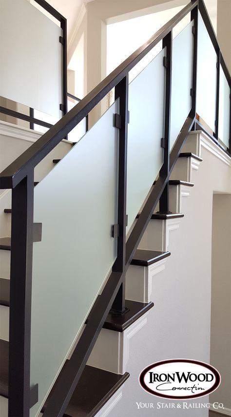 Glass and wrought iron systems are designed through our custom staircase services. This staircase is made of solid wrought iron and thick glass panels. These unique components bring a modern look and feel to any home. We offer parts, install services, and custom components throughout Texas. Click the image for more information. Ms Railing With Glass Design Balcony, Ms Railings For Stairs, Wrought Iron Railings Interior, Ms Railing Design For Staircase, Ms Railing Design Balcony, Glass Railing Stairs Modern, Ms Staircase Designs, Staircase Glass Railing Design, Ms Railing