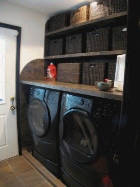 Laundry room - Table built above washer and Dryer, filled space with baskets and more baskets, love this Dark Laundry, Laundry Room Tables, Landry Room, Organized Laundry, Vintage Laundry Room Decor, Black Laundry, Laundry Room/mud Room, Vintage Laundry Room, Laundry Space