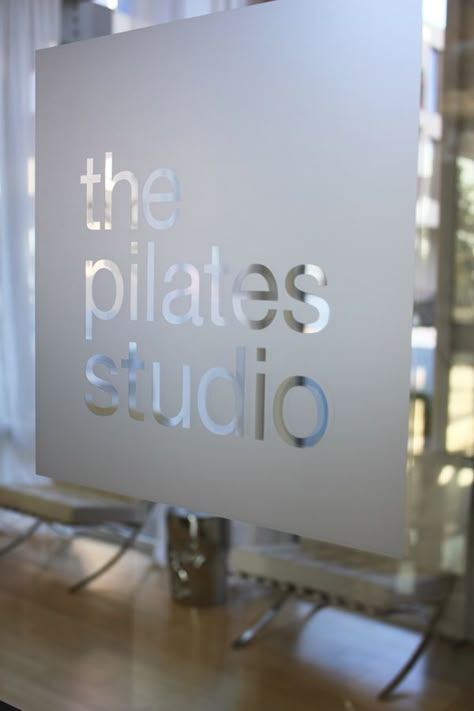 Signage On Glass Door, Pilates Studio Signage, Yoga Studio Sign, Glass Door Signage, Glass Door Sign, Window Branding, Door Sign Design, Pilates Studio Design, Pilates Yoga Studio