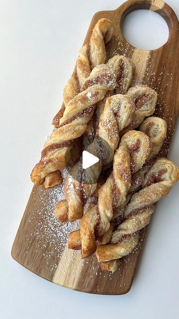 Ashley Lamego ♥ on Instagram: "Cinnamon Twists ✨

1 puff pastry sheet 
1/2 cup of sugar 
2 tsp of cinnamon 
3 tbsp of butter (melted) 
Icing sugar for garnish 

Thaw your puff pastry sheet (it should still be cold to the touch). Roll it out slightly, but make sure to keep its rectangular shape. 
In a bowl combine sugar and cinnamon. 
Brush melted butter onto one side of the puff pastry sheet and cover with cinnamon sugar mixture. 
Allow the butter to absorb the sugar mixture. 
Fold the puff pastry sheet in half and cut equal strips. 
(About 11-12 strips) 
Pinching the ends of each strip twist the puff pastry about 4-5 times and place on a lined baking tray. 
Repeat this step for all the strips. 
Coat each twist with melted butter and sprinkle with cinnamon sugar. 
Bake at 400 F for about 1 Cinnamon Rolls Shapes, Cinnamon Twists Puff Pastry, Twisted Cinnamon Rolls, Puff Pastry Uses, Pastry Shapes Ideas, Puff Pastry Cinnamon Twists, Desserts With Puff Pastry Sheets, Recipes With Puff Pastry, Cinnamon Food