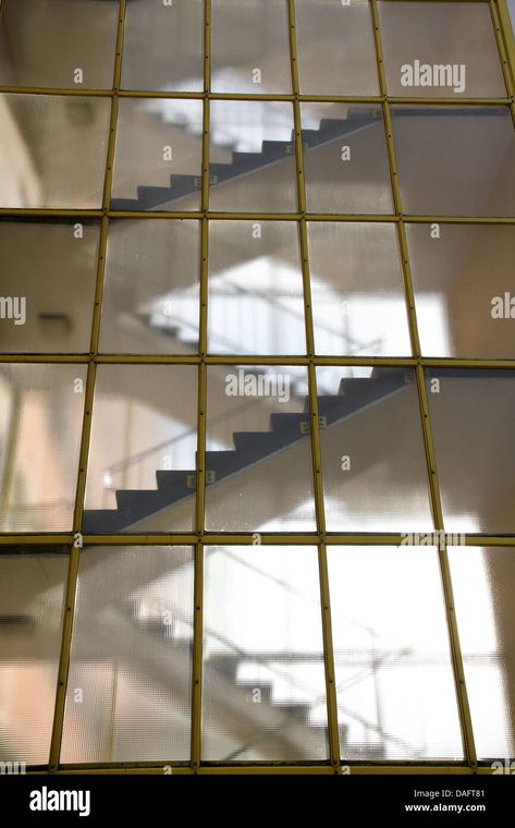 Download this stock image: Stairs behind a glass wall. Modern architecture detail. - DAFT81 from Alamy's library of millions of high resolution stock photos, illustrations and vectors. Glass Stair, Stair Well, Glass Stairs, Architecture Details, Glass Wall, Modern Architecture, Stairs, Resolution, High Resolution