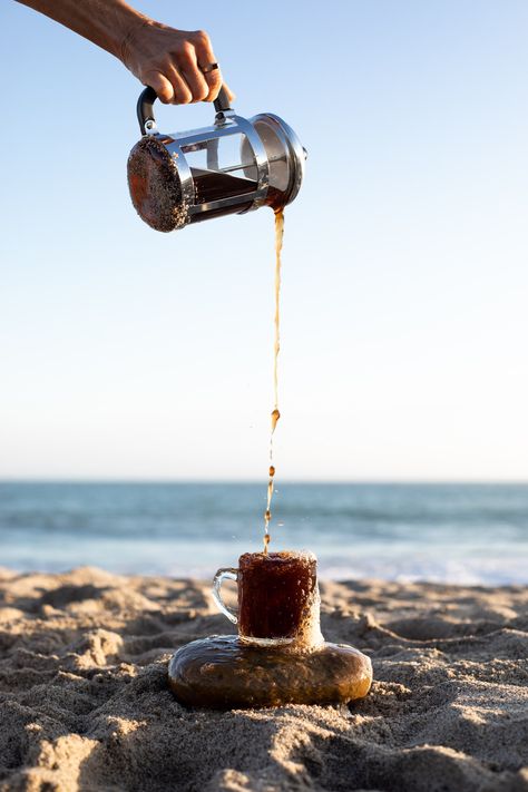 Is there any better way to start our day then with a fresh cup of coffee and a dreamy ocean view! �☕🌊⁠⠀ Coffee On The Beach Aesthetic, Summer Coffee Photography, Beach Coffee Aesthetic, Beach Coffee Shop Aesthetic, Coffee Beach Aesthetic, Coffee Photoshoot Ideas, Summer Coffee Aesthetic, Coffee Summer Aesthetic, Coffee Shop Beach