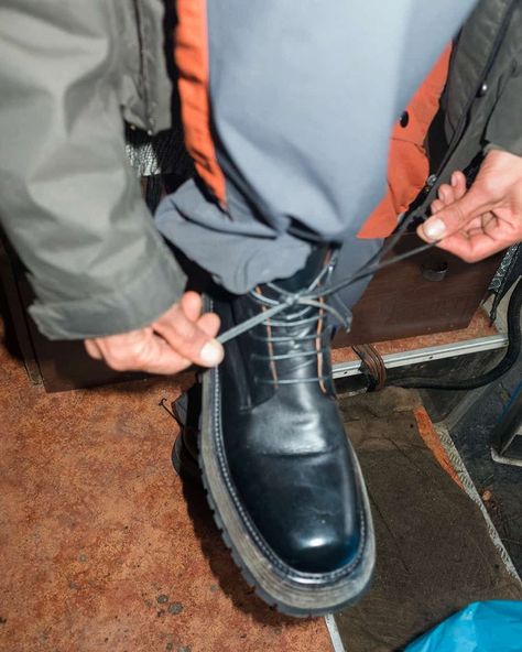 Man tying up a pair of chunky black leather boots by Marsell. This image was included in the article: 25 Luxury Shoemakers Crafting The Finest Men’s Boots, on MensFlair.com Finest Men, Luxury Boots, Leather Hiking Boots, Brogue Boots, Leather Brogues, Boot Brands, Leather Chelsea Boots, Mens Fashion Trends, Black Leather Boots