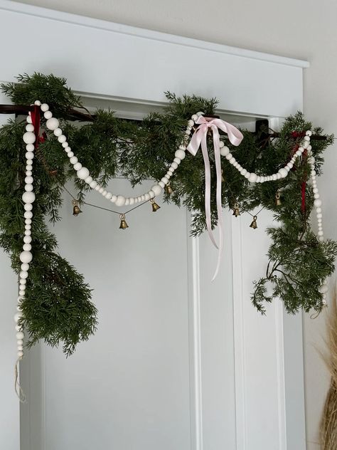 Christmas Decor Ideas Coquette, Christmas Garland Aesthetic, Garland With Bows Christmas, Door Frame Christmas Garland, Doorframe Decor Christmas, Door Frame Garland Christmas, Doorway Garland Christmas Indoor, Christmas Chain Garland, Hanging Garland On Wall