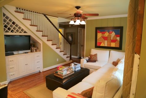 TV space under stairs Tv Under Stairs, Living Room Under Stairs, Staircase In Living Room, Room Under Stairs, White Paint Color, Stairs In Living Room, Best White Paint, Basement Stairs, White Paint Colors