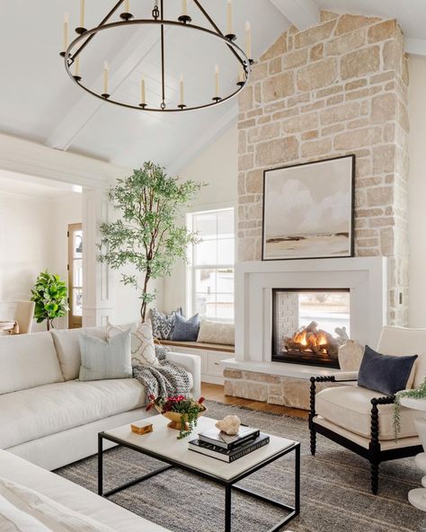 fireplace with benches • Instagram Business Decor Ideas, Farmhouse Interior Ideas, Tall Ceiling Living Room, Modern Farmhouse Interior, Stone Mantle, Built In Around Fireplace, Built In Window Seat, Vaulted Ceiling Living Room, Limestone Fireplace