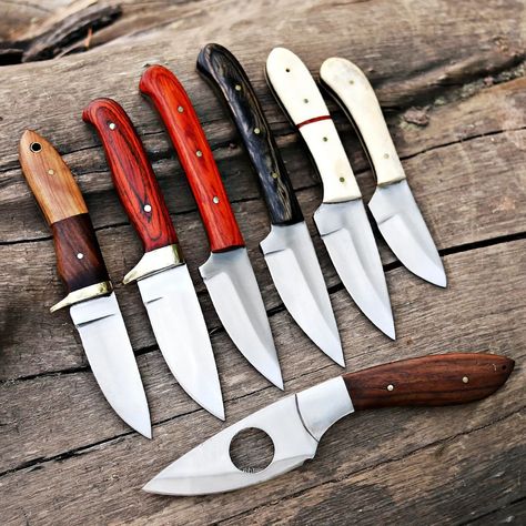 Custom Handmade Unique Set/Lot of 7 Different Knives with leather sheath - Best Gift For Him / Her These can serve purpose as hunting knives, skinners and as chef knives set too. Different designs and materials made this set a unique gift for your loved ones. Blade Material: All knives are made of D2 Steel Handle Material: 5 knives have wooden handle and 2 knives have camle bone handle Note: Package contains 7 knives same as shown in pictures. These superb design knives are hand forged and... Collector Knives, Skinning Knife, Collectible Knives, Chef Knives, D2 Steel, Best Gifts For Him, Chef Knife Set, Custom Knife, Bowie Knife