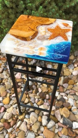 We couldn’t resist in making this accent table 🏝️ The combination of shells with the starfish, olive wood and ocean waves.  Little slice of the ocean 🌀

✨Table Top Epoxy Resin mixed with sand.  Setting the sea shells in the sand.
✨First set of waves with Designer Art Resin
✨Flood with #liquidglass Deep Pour 2-4” Epoxy Resin
✨Demold, sand and shape
✨Couple top coats with Designer Art Resin

@superclearepoxy #superclearpartner

#coastaldecor #coastalstyle #oceanart #shellart #beachy #tropicalhome #oceantable #tropicalvibes #resinart #epoxyart #epoxytable #explore #oceanvibes #resinwaves | Tidal Wave Resin | Giulio Cercato · Endless Ocean Table, Tidal Wave, Ocean Vibes, Art Resin, Designer Art, Tropical Houses, Shell Art, Tropical Vibes, Ocean Art