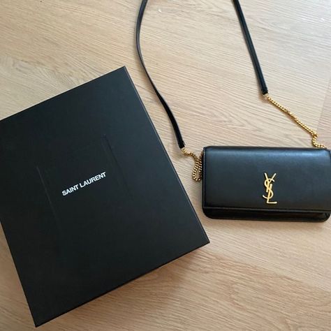 YSL Cassandra Phone Holder in Smooth Leather (Black) Ysl Phone Holder Bag, Ysl Cassandra, Saint Laurent Handbags, Wallpaper For Phone, Cute Wallpaper For Phone, Phone Holder, Ysl Bag, Smooth Leather, Mint Condition