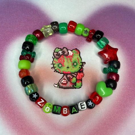 Scenecore Zombie "zombae" Kandi Bracelet - Handmade... - Depop Things To Put On A Bracelet, Kandi Perler Beads, Scenecore Bracelets, Emo Kandi Ideas, Grunge Bracelet Ideas, Scene Bracelets Kandi, Scene Kid Bracelets, Scene Kandi Ideas, Zombie Kandi