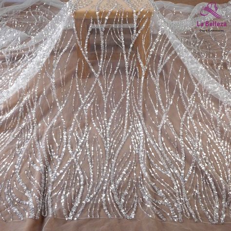 Price: The price is for 1 yard. if you buy more than 1 yard,it won't be cut. will come in one piece the longest is 20 yards. Material: polyester, sequins, beads Fixed Wide : 130cm or 51 inches. color:Off white Want to see other colors and more similar Beading lace fabrics come to: https://www.etsy.com/shop/Randyfabrics?ref=hdr_shop_menu&section_id=14192305 Shipping: Choose the shipping way you need, if you want package shipped by express,please note the phone number on order. Use for Dress,c Wedding Gown Materials, Sequin Fabric Dress, Sequin Pattern Design, Beaded Lace Pattern, Wedding Dress Material Fabrics, Lace Material Fabrics, Beaded Fabrics, Sequence Fabric, Couture Beading