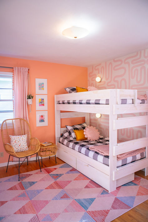 We love this vibrant girls bedroom! The beautiful barnwood finish adds a great touch to this solid wood bunk bed! We also love the storage underneath to free up some extra space and make the most of a small room. There are matching nightstands available to complete the look too! This is the perfect set up for sisters to share, sleepovers, and kids who like to change things up! Bunk beds are a classic, fun style that kids love, and this quality piece will last. It can even convert to two beds! Bunk Beds For Girls Room Decoration, Kids Bunk Bedroom Ideas, Max And Lily Bunk Bed, Bunkbed Girls Room, Girls Bedroom Ideas Bunk Beds, Cute Bunk Bed Ideas, Girls Bunkbed Bedroom Ideas, Girls Bedroom Ideas Shared Sisters, Bunk Bed Stairs