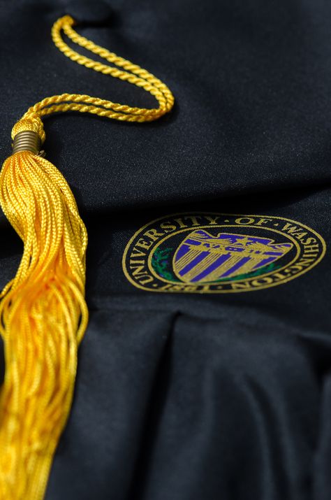 A graduation tassel and graduation robe lay next to each other commemorating a students journey through the University of Washington. #youW Photo by Luke Waters University Of Washington Graduation, Graduation Tassel, Graduation Outfits, Photography Portraits, States In America, Cap And Gown, Graduation Ideas, University Of Washington, Graduation Outfit