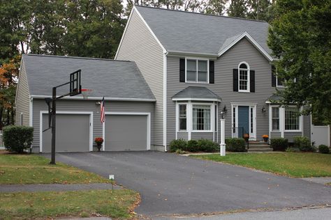 New paint exterior. Siding is Benjamin Moore Graystone 1475, front door is Benjamin Moore Philipsburg Blue HC-159 Graystone Benjamin Moore, Benjamin Moore Graystone, Exterior Paint Colors Benjamin Moore, Benjamin Moore Exterior Paint Colors, Benjamin Moore Exterior Paint, Grey Exterior House Colors, Benjamin Moore Exterior, Coventry Gray, Stonington Gray