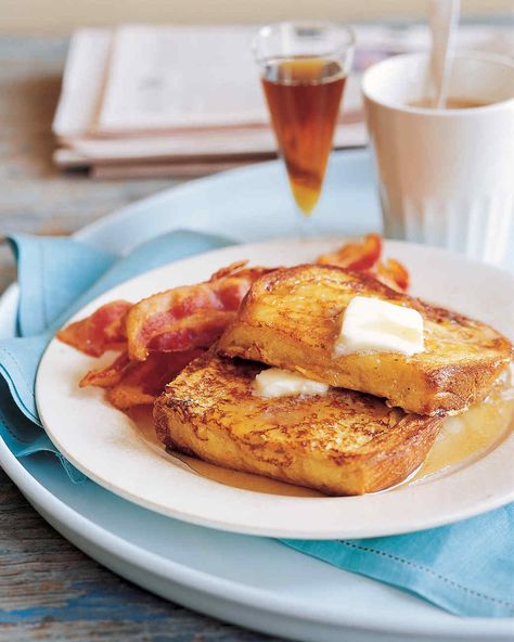 Any dense bread such as challah, brioche, or sourdough will work for this simple French toast recipe. Basic French Toast, Classic French Toast, Make French Toast, Martha Stewart Recipes, French Toast Bake, What's For Breakfast, French Toast Recipe, Meal Of The Day, Breakfast Time