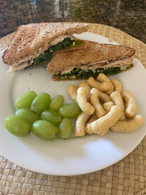 For this sandwhich I used whole grain bread, turkey, kale, pesto and cheese. On the side I had grapes and Hippeas (things made from chickpeas) which are one of my favorite snacks. Kale Sandwich, Healthy Period Food, Turkey Pesto Sandwich, Period Food, Bread Turkey, Turkey Pesto, Vegetable Lunch, Pesto Sandwich, Healthy Period