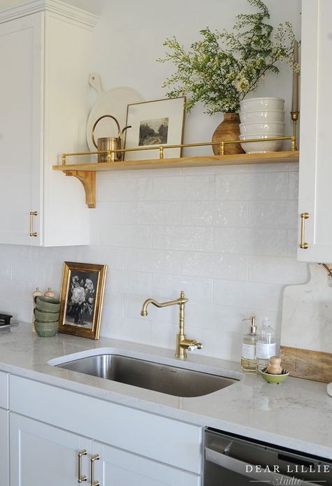 Kitchen Over Sink Shelf, Kitchen Sinks No Window, Open Shelving By Sink, Wooden Shelves Above Kitchen Sink, Decor Above Kitchen Sink With No Window, Kitchen Sink On Interior Wall, What To Put Over Kitchen Sink With No Window, Sink With Shelves Above, Kitchen Sink Against Wall With No Window