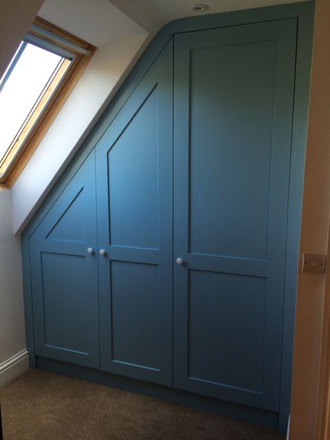 Bespoke angled wardrobes painted in Little Greene "Sky Blue' Angled Wardrobe Ideas, Blue Attic Bedroom, Staircase Wardrobe, Loft Conversion Wardrobes, Slanted Ceiling Bedroom, Country Cottage Bedroom, Attic Bedroom Storage, Bedroom Built Ins, Fitted Wardrobe