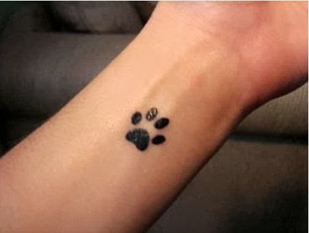 100 Cute and Small Tattoo Ideas for Women and Girls Cat Paw Print Tattoo, Wrist Tattoos Girls, Small Dog Tattoos, Pawprint Tattoo, Dog Paw Tattoo, Small Tattoos With Meaning, Paw Tattoo, Small Wrist Tattoos, Cute Small Tattoos