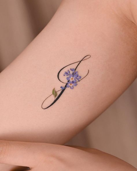 lettering J with forget-me-not🪻 done at @idont_inkso #shanghaitattoo #tattoo #tattooist #tattooartist #tattooart #tattoodesign… | Instagram Minimalist Symbols, J Tattoo, Tiny Wrist Tattoos, Cool Wrist Tattoos, Tasteful Tattoos, Delicate Tattoo, Initial Tattoo, Tattoo Ideas For Women, Wrist Tattoos For Women