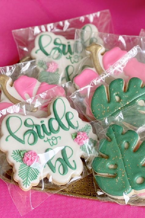 Tiki Bridal Shower Ideas, Jungle Theme Bridal Shower Ideas, Hawaii Themed Bridal Shower Ideas, Tropical Theme Bridal Shower Decor, Stitch Bridal Shower Ideas, Hawaiian Themed Engagement Party, Flamingo Bridal Shower Theme, Tropical Theme Engagement Party, Tropical Bridal Shower Cookies