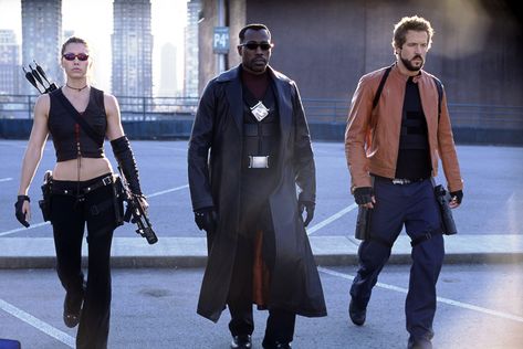 "Blade: Trinity" movie still, 2005.  L to R: Jessica Biel, Wesley Snipes, Ryan Reynolds.  PLOT: Blade (Snipes) teams up with a pair of vampire hunters (Biel, Reynolds) for a battle with the one and only Dracula.  During the making of this movie, Reynolds talked to director David S. Goyer who was adapting a Marvel Comic book for the big screen.  Ryan said he was interested in portraying a super hero. Blade Trinity, Blade Film, Police Font, X-men Wallpaper, Blade Movie, X Men Funny, Blade Marvel, Parker Posey, Film Marvel