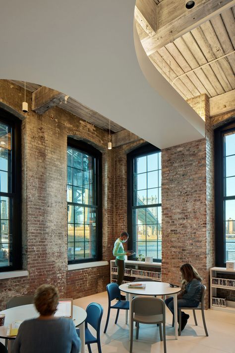 WORKac blends old and new at Adams Street Library in Brooklyn Brooklyn Library, Street Library, Shaped Windows, Library Pictures, Architecture Company, Timber Ceiling, Brooklyn Bridge Park, Contemporary Ceiling, New York Studio